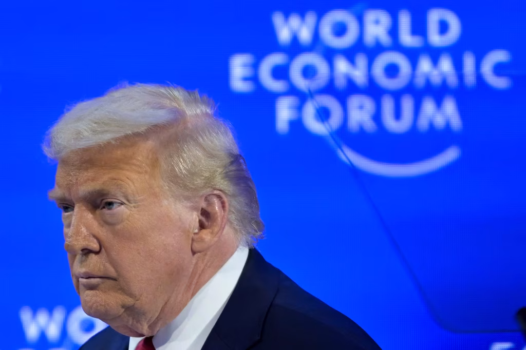 U.S. President Donald Trump enters the stage for his special address during the 56th annual meeting of the World Economic Forum, WEF, in Davos, Switzerland, Wednesday, Jan. 21, 2026. (Gian Ehrenzeller/Keystone via AP)